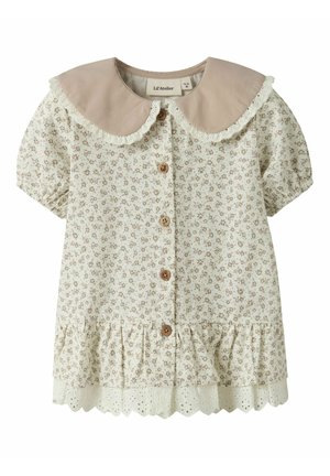 Vaniljekreemiga beebikleidi väikepruun lillemuster, beež ümar kaelus pitsi äärega, puidust nööbid, volangvarrukad ja pitsist äärega alläär.