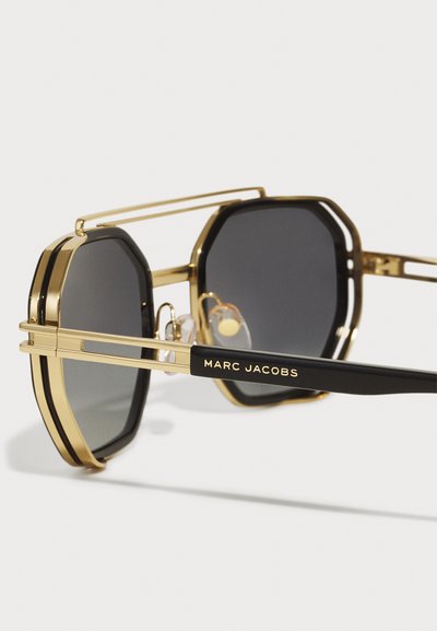 MARC JACOBS MARC  - Lunettes de soleil - gold-coloured/ black