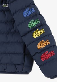 Lacoste PATCHES PUFFE - Vinterjakke - marine