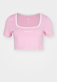 Rosa kort topp i mjuk bomull, med korta ärmar, fyrkantig halsringning och en vit Nike-logga tryckt på framsidan. Avslutning i vitt.
