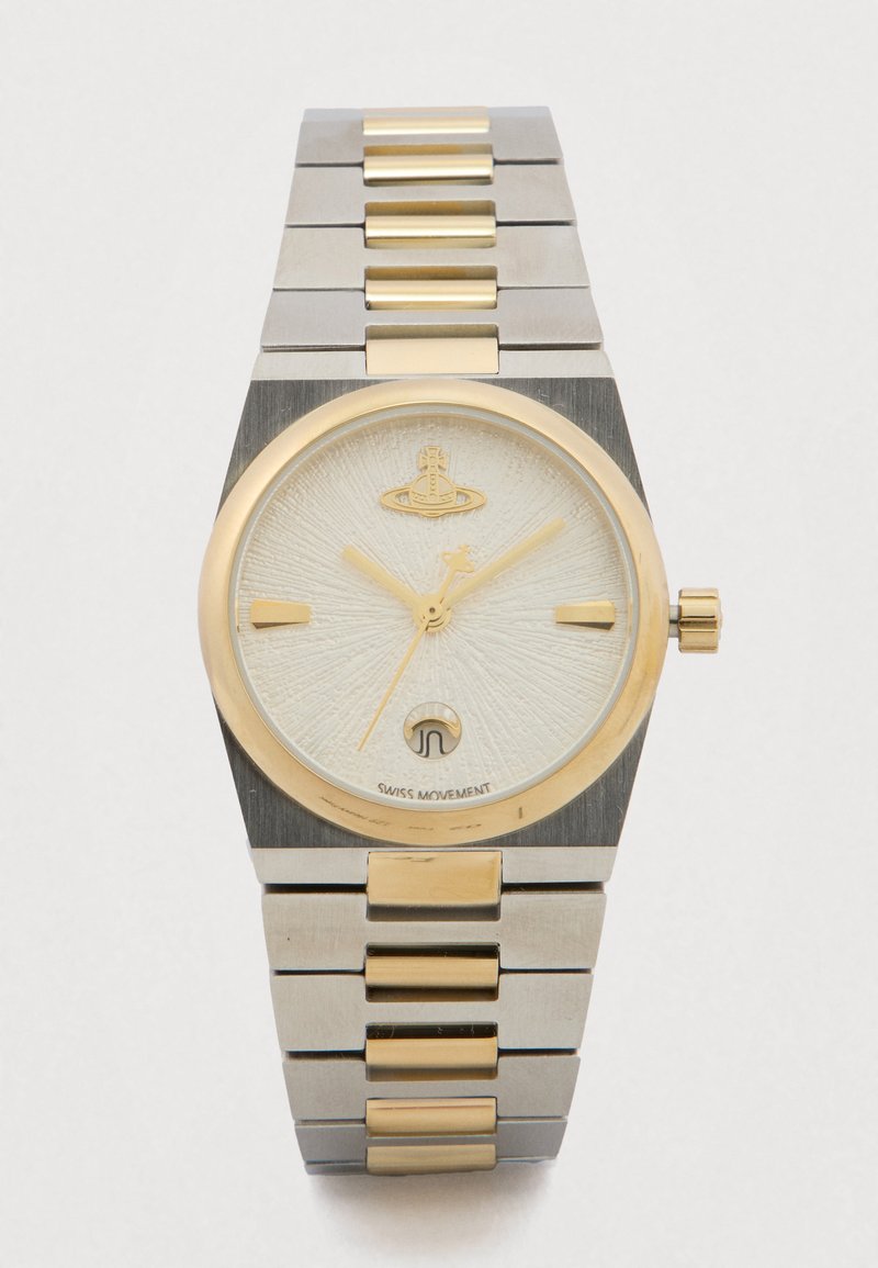 Relógio de pulso em prata e ouro com mostrador branco texturizado, ponteiros dourados, logótipo às 12 horas e janela de data acima das 6 horas numa pulseira metálica.