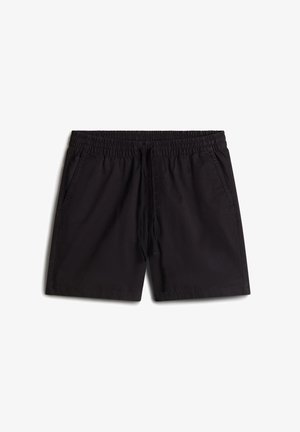 Black shorts made from lightweight fabric, featuring an elastic waistband with drawstring, side pockets, and a simple, clean design.