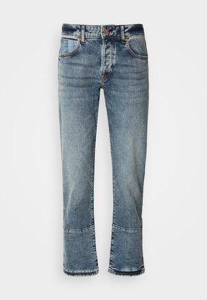Light blue denim jeans with a straight leg, featuring two front pockets and a button closure. The hem is slightly frayed for a casual look.
