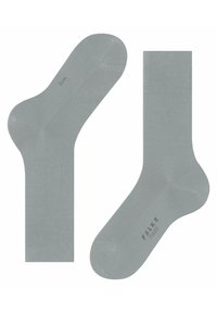 Calzini grigi chiari con un design a righe, caratterizzati da una texture liscia, tallone e punta rinforzati, e logo stampato sulla suola.