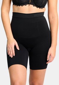 Zwarte shaping shorts met een hoge taille en een gladde textuur. Kenmerkt zich door naadloze constructie en een stevige tailleband voor comfort.