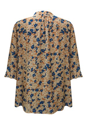 Blouse à motif floral dans des teintes de bleu et de marron, avec un tissu texturé, une coupe décontractée et des manches trois-quarts avec des boutons volants.