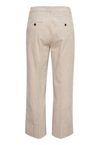 Pantalon en velours côtelé beige à jambes droites, passants de ceinture et deux poches arrière boutonnées.