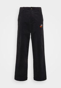 TREND PANT - Tygbyxor - black/team orange/university gold