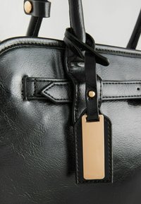 Next BELTED - REGULAR FIT - Rankinė - black
