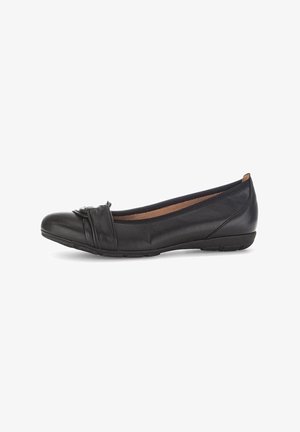 Black leather ballet flats with a rounded toe, featuring a decorative knot detail at the front and a low, flexible sole.