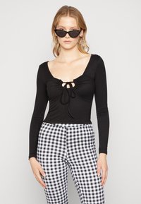 Noisy May NMPASA FLARED PANTS - Leggings - Calças - bright white