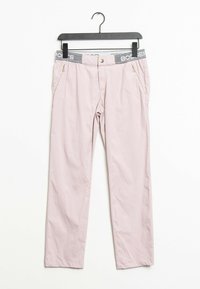 Pantalon rose clair avec une taille élastique présentant une accentuation gris foncé, deux poches latérales zippées et une coupe droite.