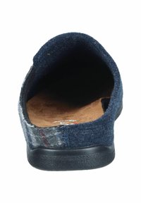 Wool felt slipper in navy blue with a textured surface. Open back design, brown suede insole, and a black rubber sole.