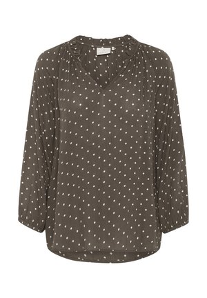 Braune Bluse mit weißen Punkten, V-Ausschnitt, Dreiviertelärmeln und plissiertem Detail am Ausschnitt. Weicher, leichter Stoff.