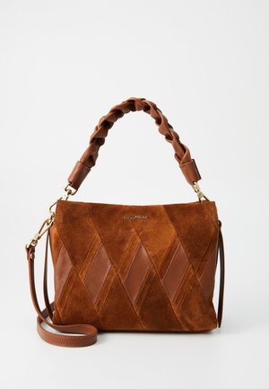 Brown suede handbag featuring a diamond pattern, smooth leather accents, a braided handle, and a detachable shoulder strap.
