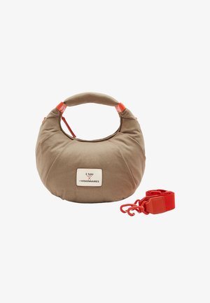 Taupe crescent-shaped handbag with padded top handle, red zipper and detachable red shoulder strap, logo patch on front center.