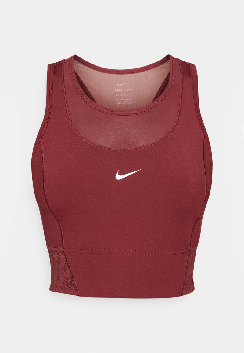 Sujetador deportivo burdeos hecho de un tejido elástico y que absorbe la humedad. Presenta un panel de malla en el escote y un logotipo blanco de Nike en el centro.