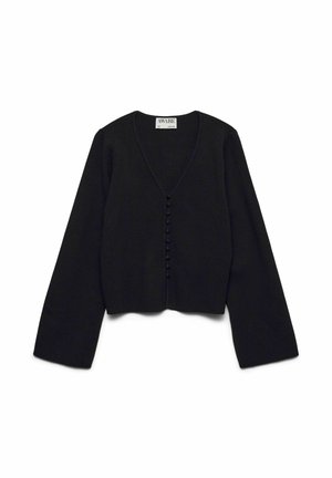 Cardigan noir court en maille, avec un décolleté en V, des manches longues et une rangée de boutons ronds sur le devant.