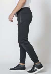 Koroshi JOGGING  - Tepláky - black