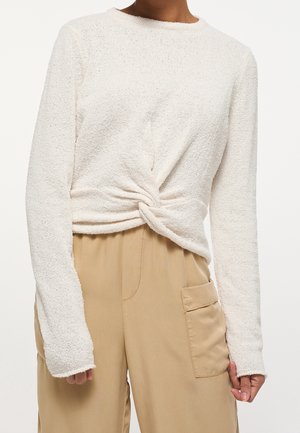 Stickad tröja - off-white