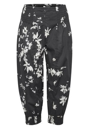 Black pants with a floral white pattern, elastic waistband, and tapered cuffs. Made from lightweight fabric and features pleated design.