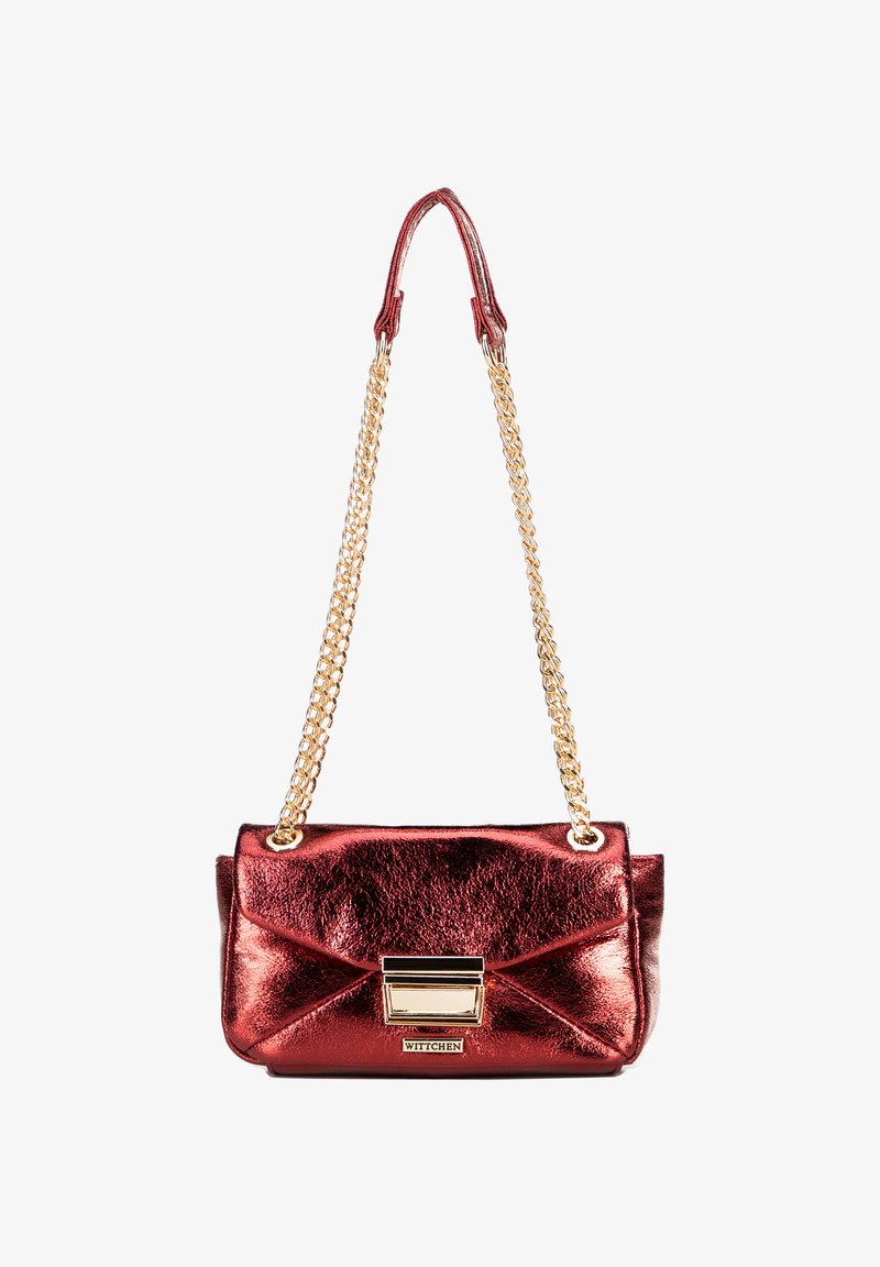 Red metallic faux leather handbag with a gold chain strap, featuring a flap closure and decorative hardware. Textured surface with stitching details.