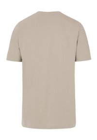 Camiseta de manga corta color beige claro con cuello redondo, hecha de algodón suave, con una textura lisa y un diseño simple y sin adornos.