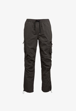 Mørkegrå cargo bukser med elastisk talje og snor. Har flere lommer og justerbare manchetter for en afslappet pasform.