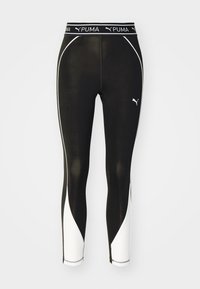 Czarne legginsy Puma z białymi panelami bocznymi, dopasowany krój, elastyczny pasek w talii z logo Puma i gładka faktura.