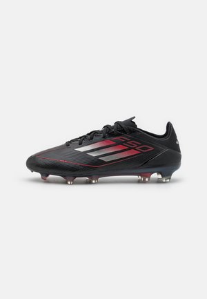 F50 PRO FIRM GROUND - Futbola apavi, cieta zeme - core black/iron metallic/lucid red