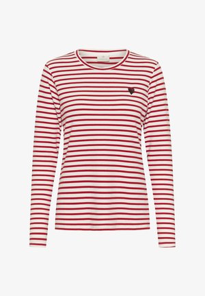 Košile s dlouhými rukávy vyrobená z bavlny, s červenými a bílými vodorovnými pruhy, kulatým výstřihem a malým detailem srdce na hrudi.