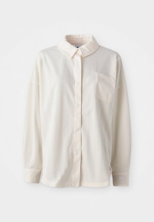 Camisa blanca de botones con cuellos, de rayas verticales, de manga larga, con un solo bolsillo en el pecho, hecha de una tela suave con una textura tacto agradable.