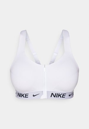 Witte sportbeha met een ritssluiting aan de voorkant, brede grijze elastische band met zwarte "NIKE"-logo en verstelbare bandjes voor een veilige pasvorm.