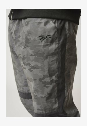 Project X Paris DE JOGGING RÉFLÉCHIS MOTIF CAMOUFLAGE - Trainingsbroek - noir