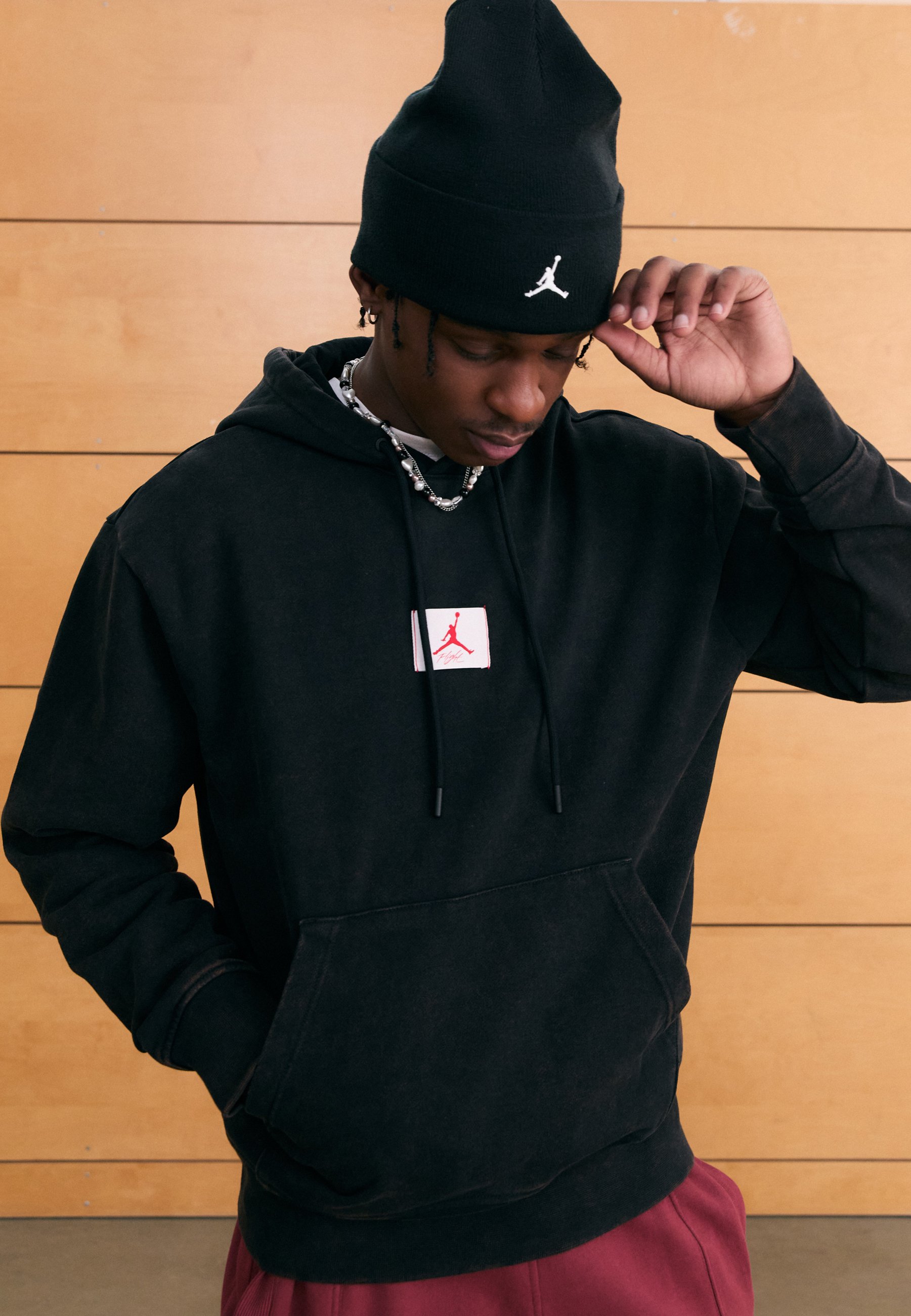 black jordan hoodie red logo
