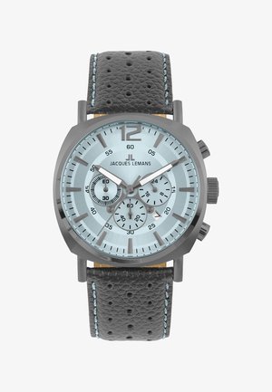 Chronografur med en lys blå urskive, grå rustfrit stål sag, og sort læderrem med blå syninger og perforeringer.