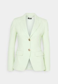 Blazer verde chiaro realizzato in tessuto liscio, con un design sartoriale, rever a pattina e bottoni dorati, dotato di due tasche frontali.