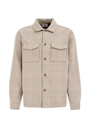 Beige ruuduline särk-jakk, mis on valmistatud tekstuurilisest kangast, ees on nööbiga kinnitamine, kaks rinna taskut ja kraega kaelus.