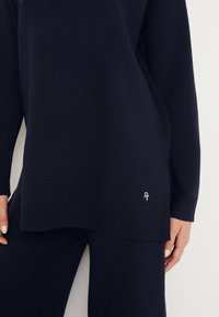 Next Sweter