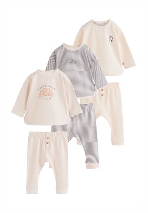 Three sets of long-sleeved baby tops and pants in beige and gray tones, featuring stripes and small printed designs with button details.