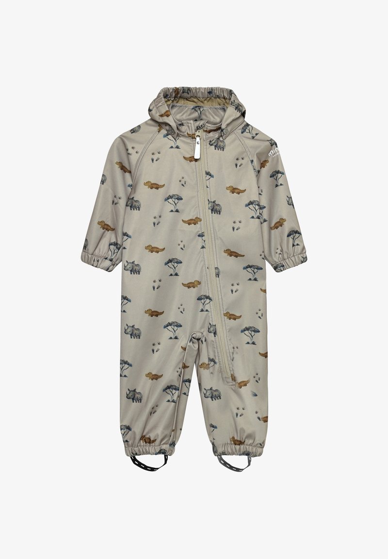 Combinaison de pluie beige clair avec une fermeture éclair, ornée d'un imprimé dinosaure et animaux. Elle possède des poignets élastiques, une capuche et des sangles réglables aux chevilles.