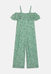 Zielony kombinezon w kwiaty z opadającymi rękawami wyko�ńczonymi falbaną, o luźnym kroju i teksturowanym materiale z białymi wzorami.