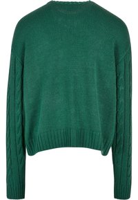 Pull vert en maille avec motif torsadé sur les manches, col rond et ourlet côtelé. Tissu texturé, coupe courte et manches longues.