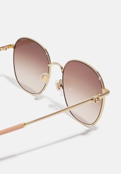 Gucci Γυαλιά ηλίου - gold-coloured/brown