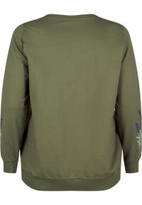 Sudadera verde oliva con mangas largas, decorada con bordado de lavanda en los puños, hecha de un tejido suave y elástico. Textura suave.