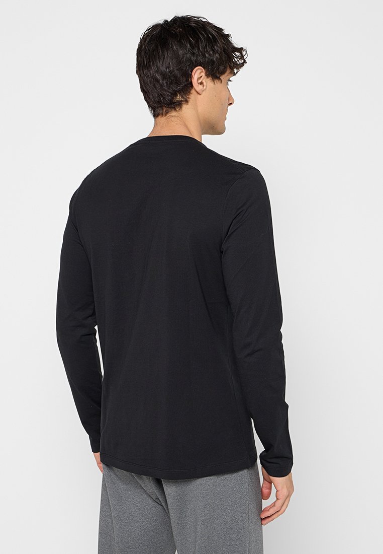 Schwarzes Langarm-T-Shirt aus Baumwolle mit rundem Halsausschnitt und normaler Passform, von hinten ohne sichtbare Grafiken dargestellt.