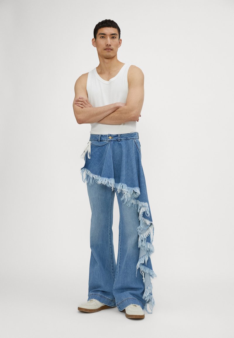 Palomo DISTRESSED OVERSKIRT TROUSERS UNISEX - Relaxed fit jeans - washed light blue denim