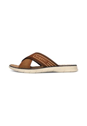 Brown slip-on sandal with crossed fabric straps and white cushioned sole, branded with "bugatti" on the top strap.