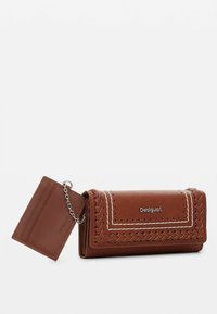 Brown leather wallet with a braided design, silver hardware, white stitching, and a detachable cardholder attached by a chain.