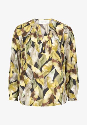 Tryckt blus med en delad V-krage, långa ärmar och ett mönster av gula och gröna blad på en mörk bakgrund; lättviktig tyg.